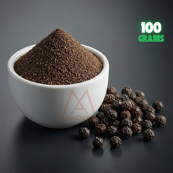 White bowl filled with ground black pepper and black peppercorns on dark surface, 100 grams label