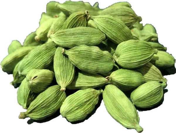 Close-up of whole green cardamom pods pile isolated on white background