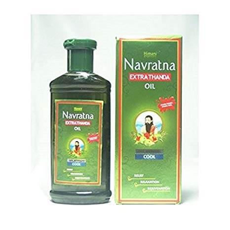 Navratna Extra Thanda Oil bottle and packaging with green label for cooling and relieving stress
