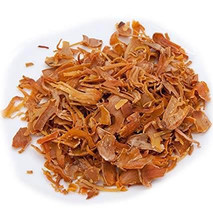 Dried mace spice flakes isolated on white background for cooking and seasoning