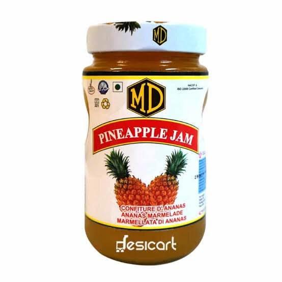 MD brand pineapple jam jar with pineapple image and multilingual label on white background