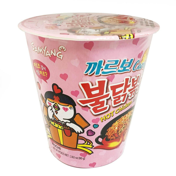 Samyang hot chicken flavor instant noodles cup with pink heart-themed packaging and cartoon chicken
