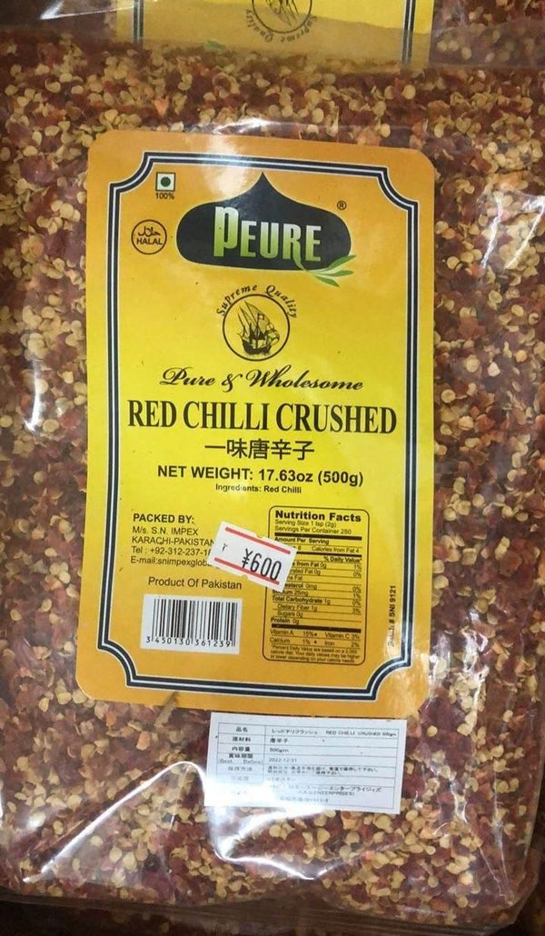 Peure brand 500g bag of crushed red chili with yellow label and product details