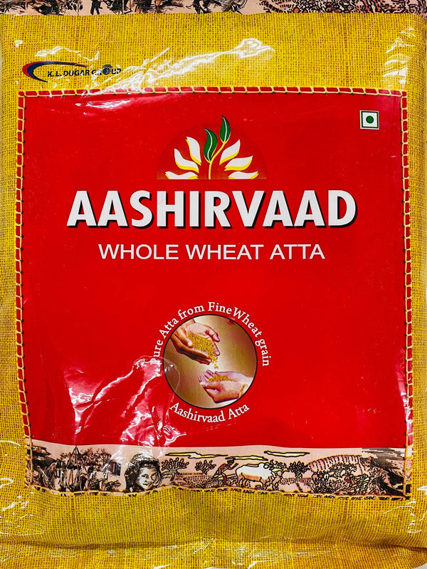 Aashirvaad Whole Wheat Atta flour pack with red and yellow design and wheat grain graphic