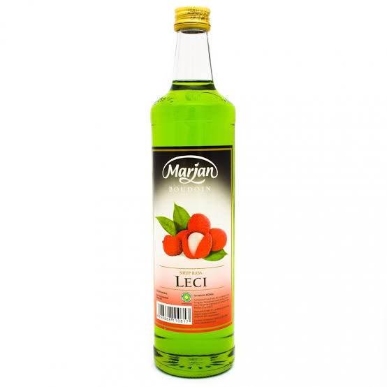 Marjan Leci syrup bottle with green liquid and lychee fruit label on white background