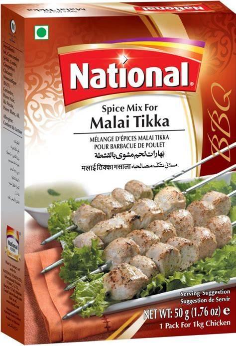 National Malai Tikka BBQ spice mix box with grilled chicken skewers on lettuce