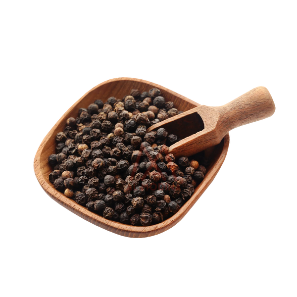 Black peppercorns in a square wooden bowl with a wooden scoop on a black background
