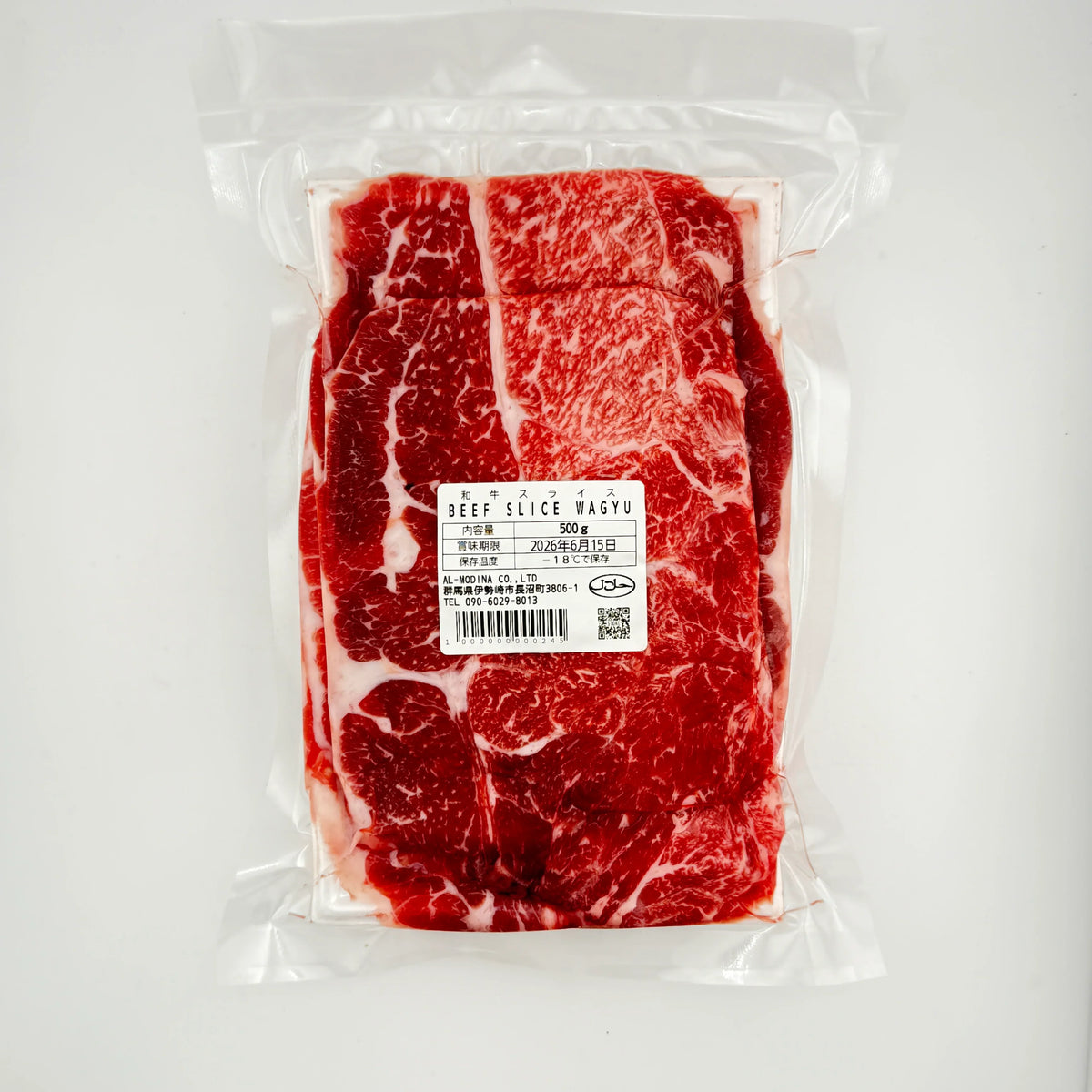 Vacuum-sealed 500g package of Wagyu beef slices with marbling and label on white background