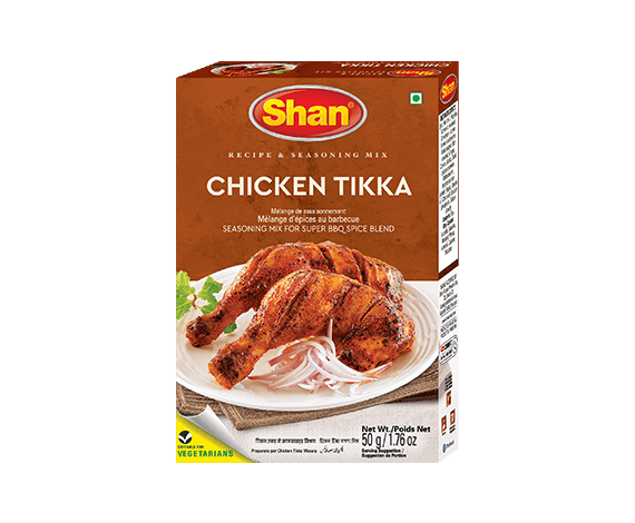 Shan Chicken Tikka seasoning mix box with grilled chicken on plate and onion slices, 50g