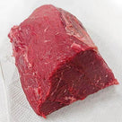 Raw beef steak cut resting on a white paper towel, showcasing fresh red meat texture
