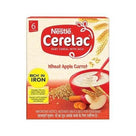 Nestle Cerelac Wheat Apple Carrot baby cereal with milk rich in iron with image of bowl, spoon, wheat grains, apple slice, and carrot