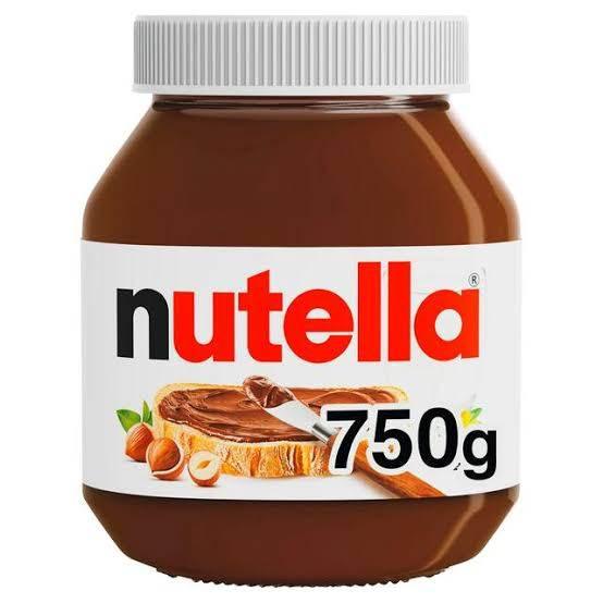 750g jar of Nutella hazelnut spread with bread slice and hazelnuts on label