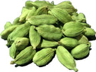 Close-up of whole green cardamom pods isolated on white background, aromatic spice