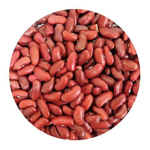 Close-up of red kidney beans packed tightly in a circular frame
