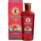Navratna Ayurvedic Oil Cool with 9 herbal ingredients in red bottle and box packaging