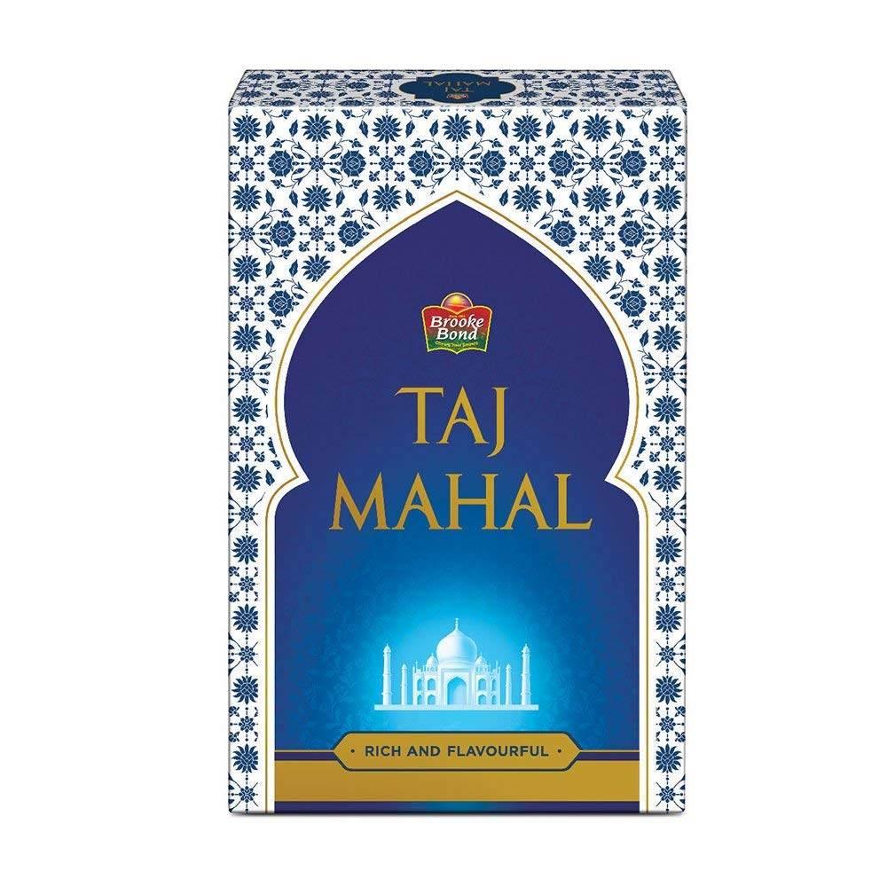 Brooke Bond Taj Mahal tea box with blue and white floral design, labeled rich and flavourful