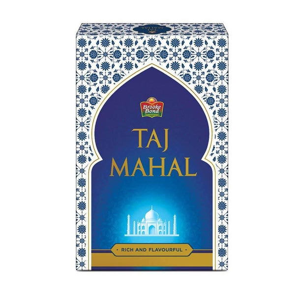 Brooke Bond Taj Mahal tea box with blue and white floral design, labeled rich and flavourful