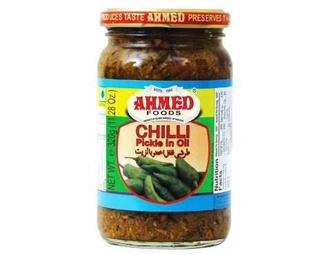 Jar of Ahmed Foods Chilli Pickle in Oil, 320g, with green chilies on label and red lid