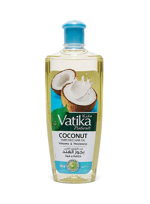 Vatika Naturals Coconut Enriched Hair Oil bottle with blue cap for volume and thickness
