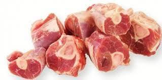 Fresh raw beef shank meat pieces with visible cross-sections, isolated on white background
