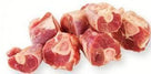 Fresh raw beef shank meat pieces with visible cross-sections, isolated on white background