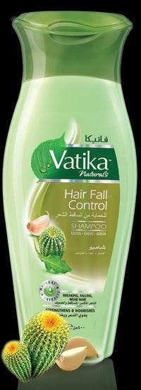 Vatika Naturals Hair Fall Control shampoo bottle with cactus and garlic extracts on green background