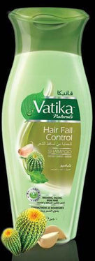 Vatika Naturals Hair Fall Control shampoo bottle with cactus and garlic extracts on green background