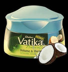 Dabur Vatika Original Volume & Thickness Styling Hair Cream container with coconuts on white background