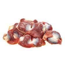Pile of raw chicken gizzards isolated on white background, fresh poultry meat