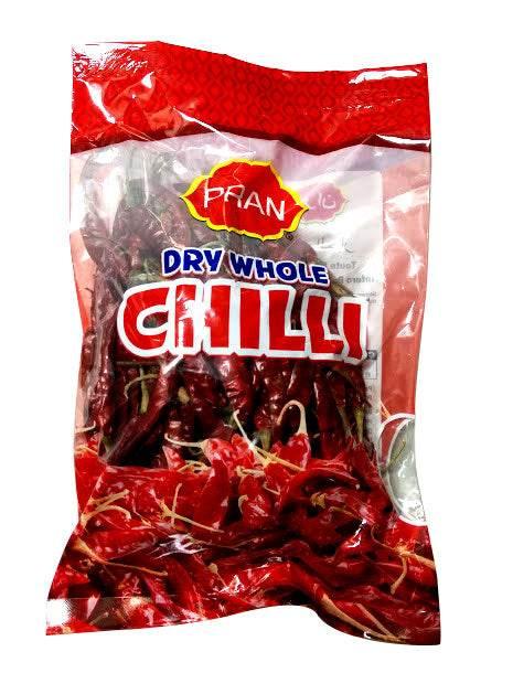 Pran brand dry whole red chili peppers in transparent red packaging