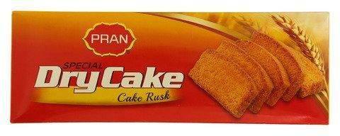 PRAN Special Dry Cake Cake Rusk box with slices of dry cake and wheat design on orange background
