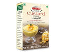 Ahmed Foods mango custard powder box with glass bowl of mango custard dessert and fresh mango cubes