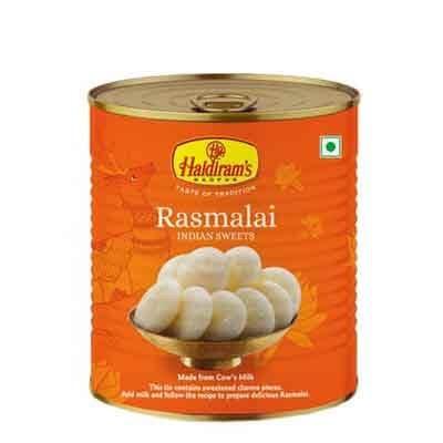 Haldiram's Rasmalai canned Indian sweets in orange packaging with bowl of white Rasmalai