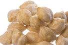 Close-up of raw dry chickpeas with a light tan textured surface