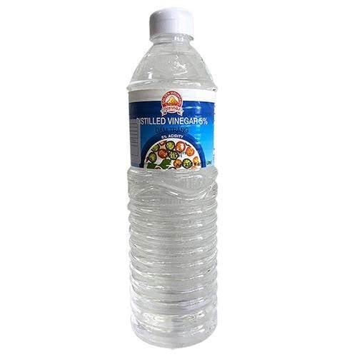 Clear plastic bottle of distilled vinegar 5% acidity with white cap and blue label