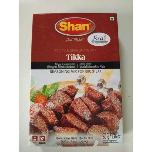 Shan Tikka BBQ steak seasoning mix packet with grilled meat skewers image