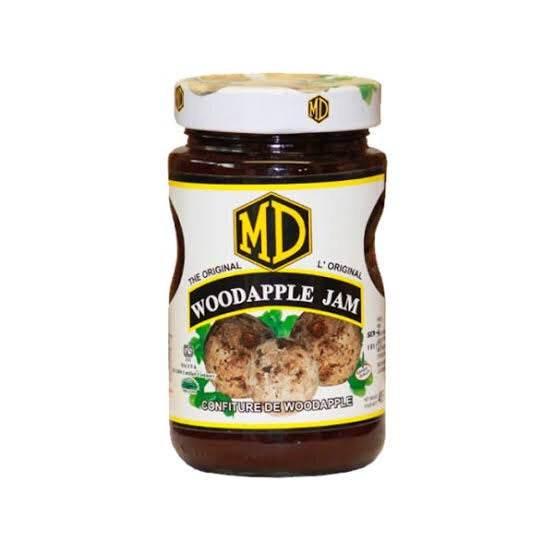 Jar of MD Woodapple Jam with white label and woodapple fruit image