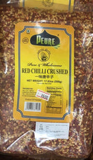 Peure brand 500g bag of crushed red chili with yellow label and product details