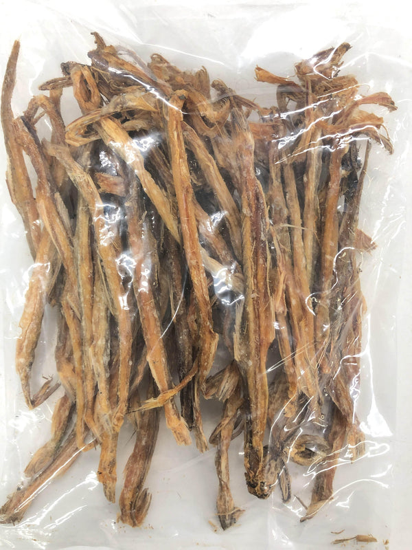 Clear plastic bag with dried fish sticks inside on a white background