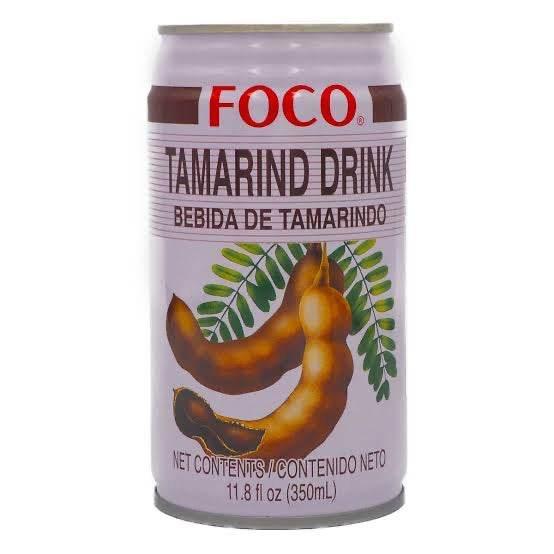 Can of FOCO Tamarind Drink with tamarind fruit and green leaves illustration, 11.8 fl oz
