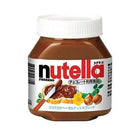 Jar of Nutella Ferrero chocolate hazelnut spread with wooden knife smeared with Nutella