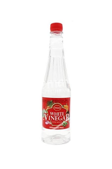 Pran white vinegar bottle with red cap and label featuring vegetables on white background