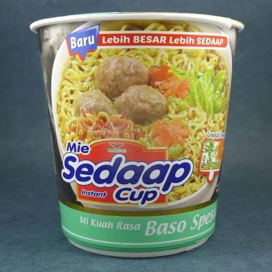 Mie Sedaap instant noodle cup with meatball flavor, colorful packaging with noodles and vegetables