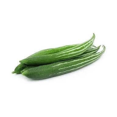 Fresh green ridge gourds with white stripes isolated on white background