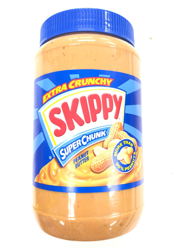 Skippy Extra Crunchy Super Chunk peanut butter jar with blue lid and label, showing peanuts