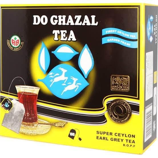 Do Ghazal Tea Super Ceylon Earl Grey tea box with logo and glass cup of tea