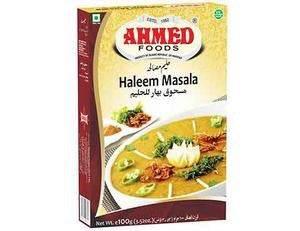 Ahmed Foods Haleem Masala spice mix box with a bowl of haleem garnished with onions and herbs
