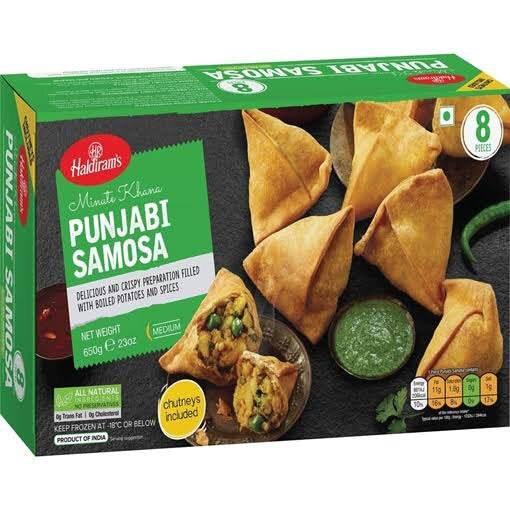 Haldirams Punjabi Samosa box showing 8 crispy samosas with green chutney and filling of boiled potatoes and peas