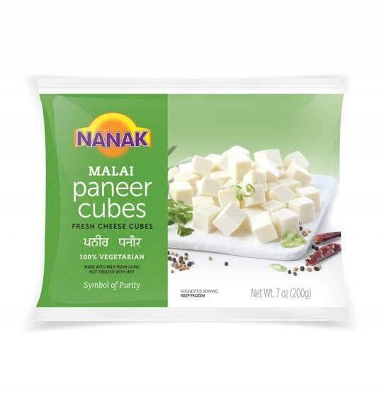 Nanak Malai paneer cubes fresh cheese 200g frozen package with white paneer cubes on plate