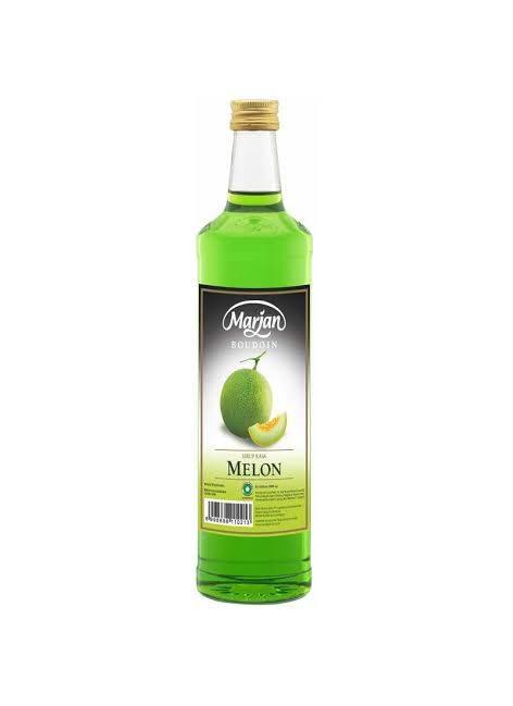 Marjan Melon syrup bottle with green liquid and gold cap on white background